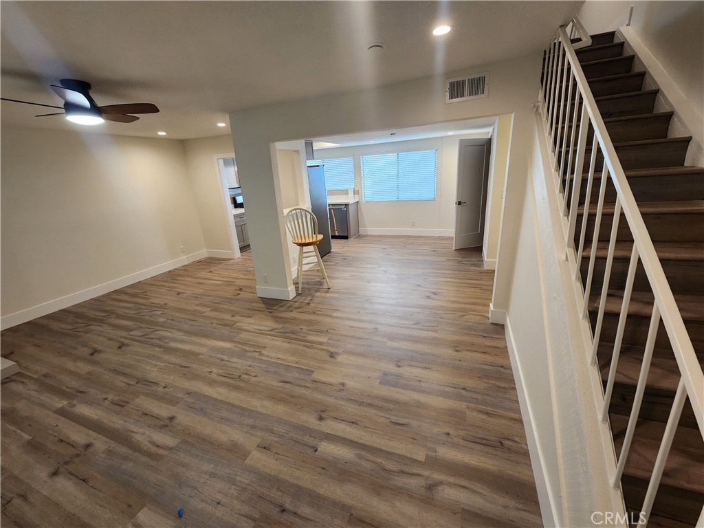 418 Avenida Santa Barbara, Unit B San Clemente, CA 92672 - Photo 6 of 52 a view of entryway and hall with wooden floor