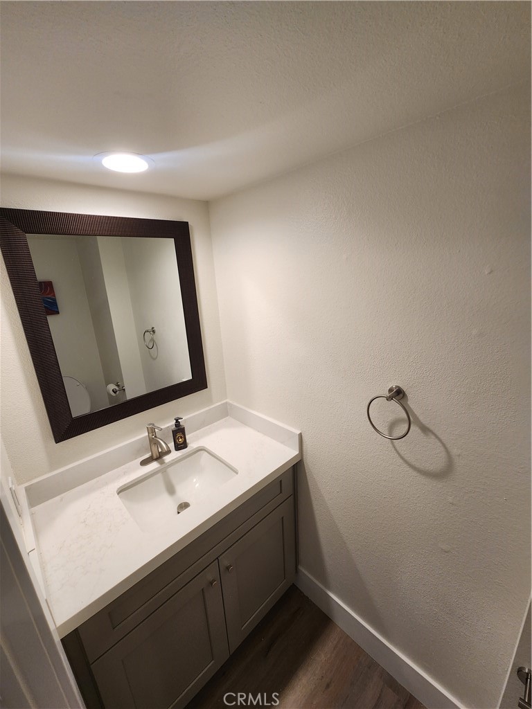 418 Avenida Santa Barbara, Unit B San Clemente, CA 92672 - Photo 8 of 52 a bathroom with a sink and mirror