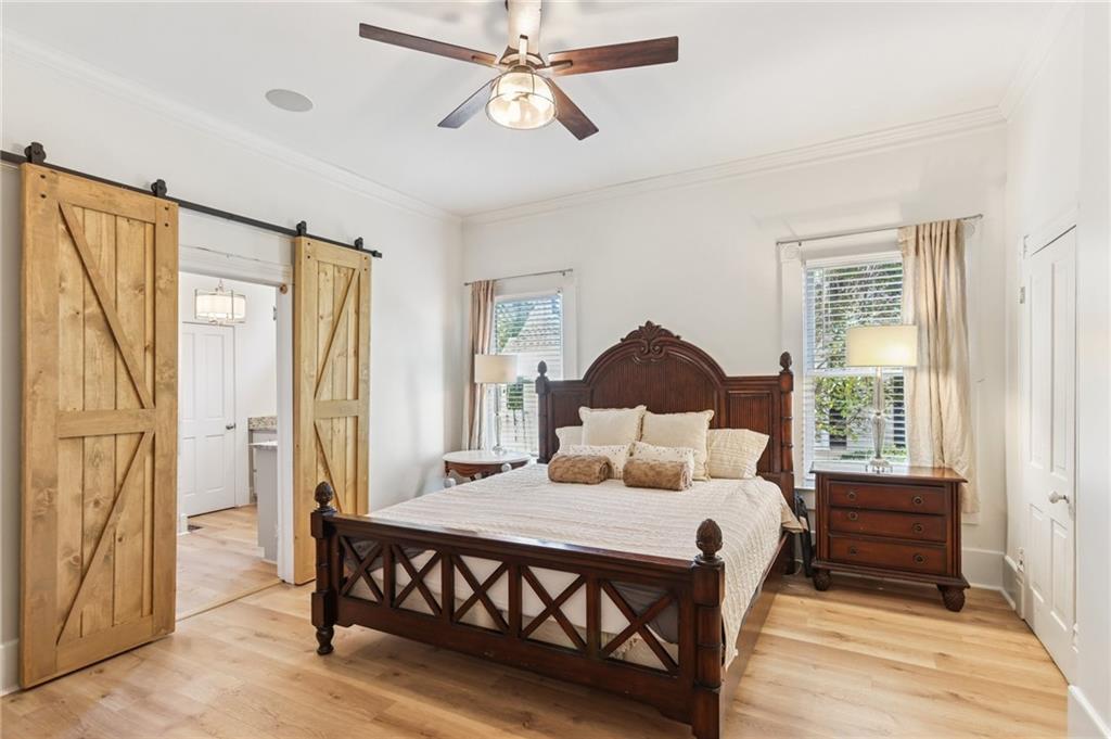 29 Sessions Street Northwest Marietta, GA 30060 - Photo 12 of 39 a bedroom with a bed and wooden floor