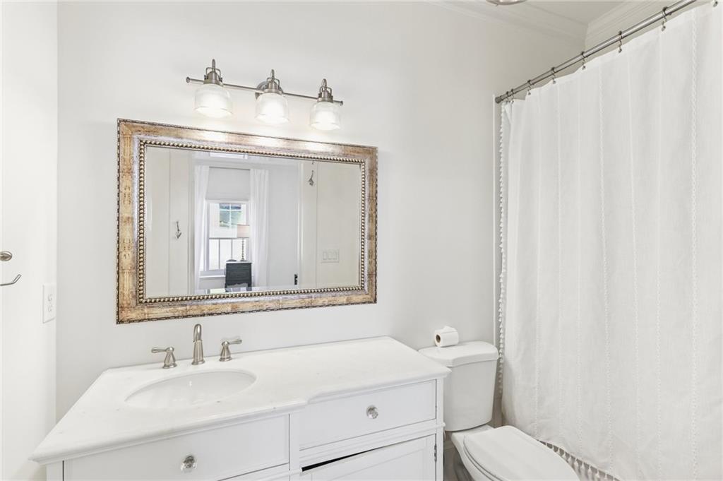 29 Sessions Street Northwest Marietta, GA 30060 - Photo 19 of 39 a bathroom with a sink and a mirror