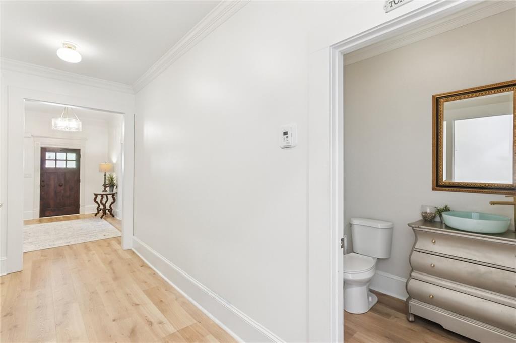 29 Sessions Street Northwest Marietta, GA 30060 - Photo 22 of 39 a bathroom with a toilet sink and vanity