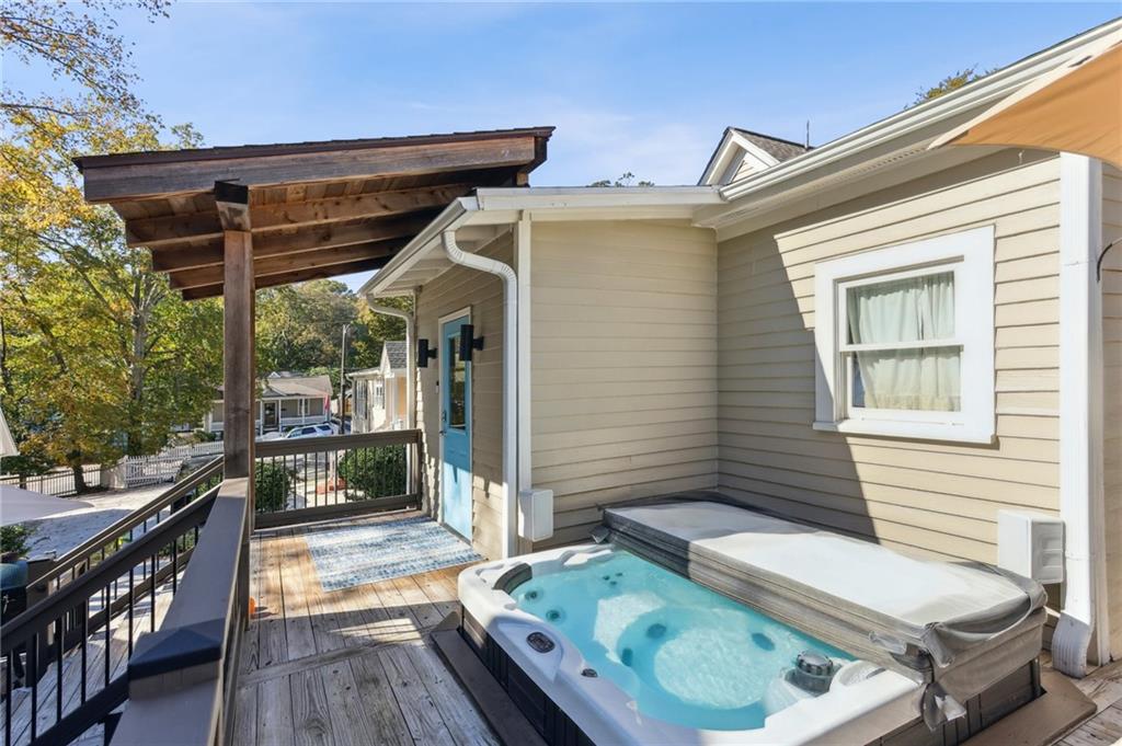 29 Sessions Street Northwest Marietta, GA 30060 - Photo 27 of 39 a balcony with furniture and a potted plant