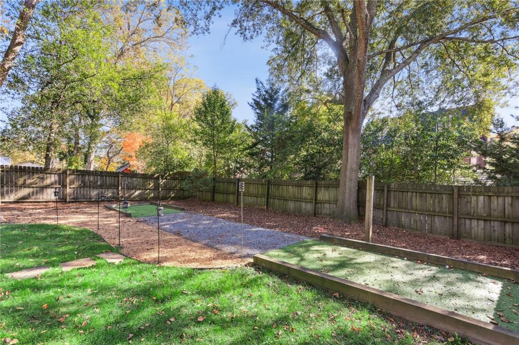 29 Sessions Street Northwest Marietta, GA 30060 - Photo 31 of 39 a view of a backyard with a tree