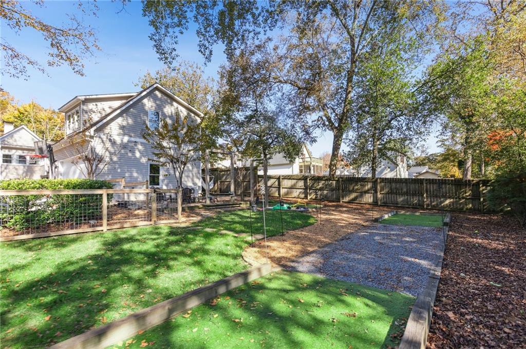29 Sessions Street Northwest Marietta, GA 30060 - Photo 32 of 39 a view of a house with backyard porch and sitting area
