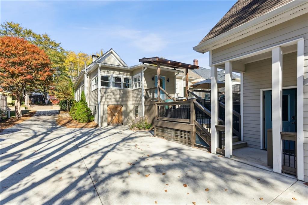 29 Sessions Street Northwest Marietta, GA 30060 - Photo 37 of 39 a view of a house with a yard and wooden fence