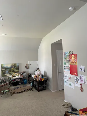 a bedroom with furniture and a bed