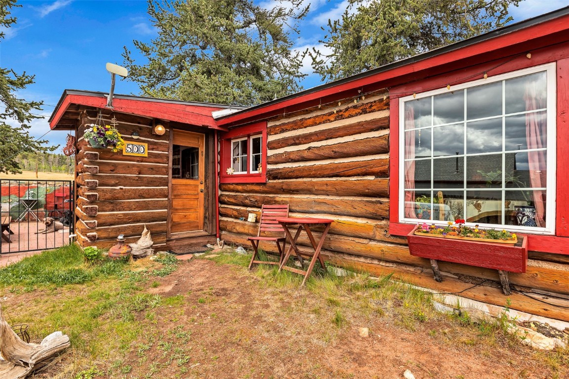 500 4th Street Fairplay, CO 80440 - Photo 3 of 48 a view of a house with a large window and wooden fence
