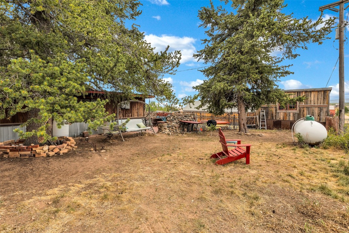 500 4th Street Fairplay, CO 80440 - Photo 31 of 48 a backyard of a house with table and chairs