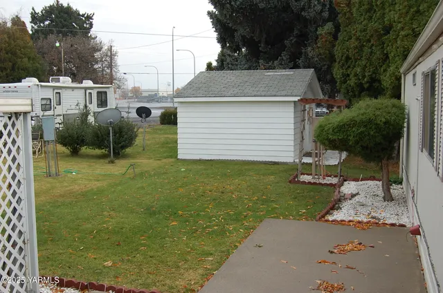 a view of a backyard with a garden