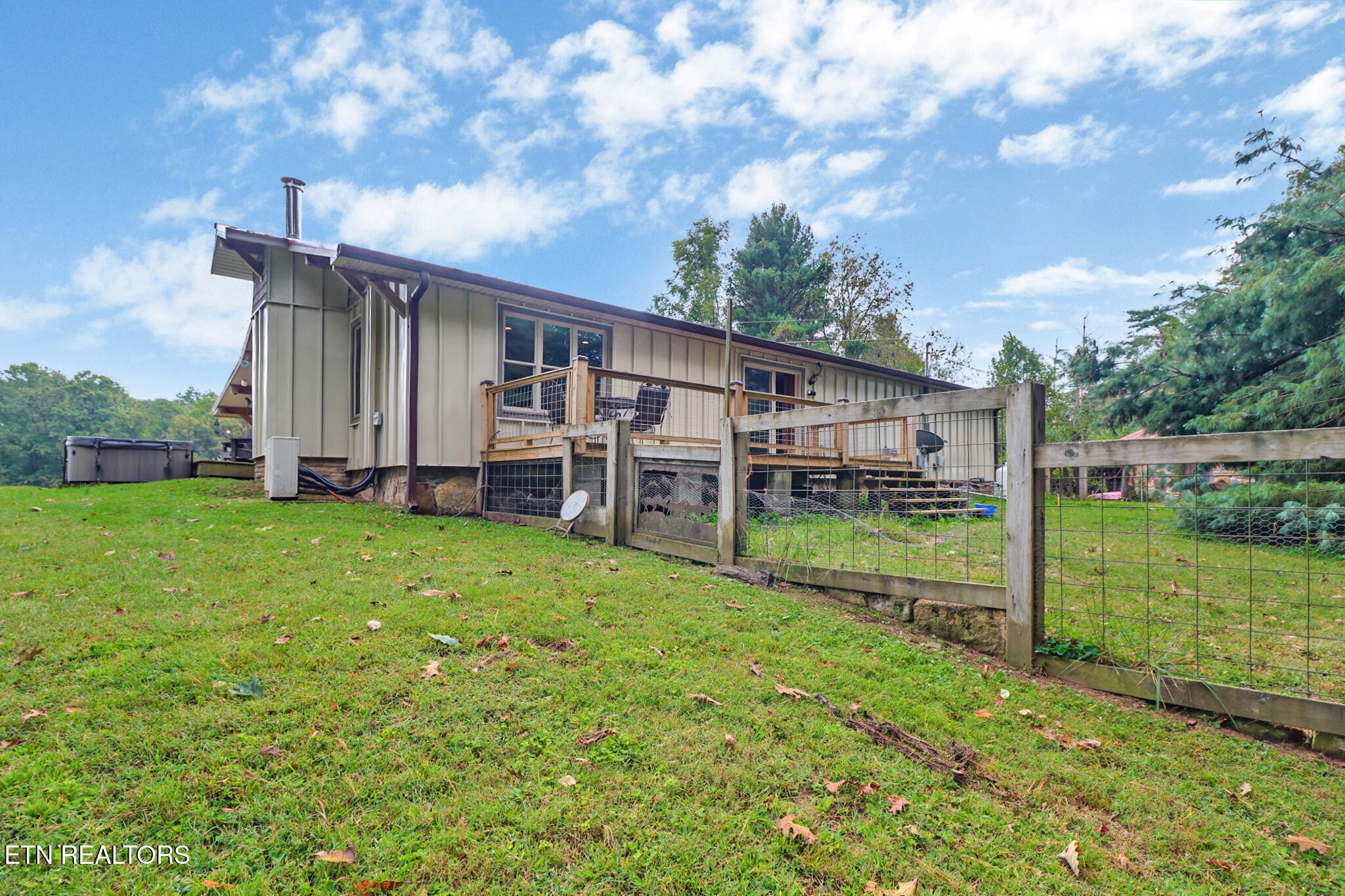 4676 Rugby Pike Allardt, TN 38504 - Photo 21 of 50 a view of a house with backyard and porch