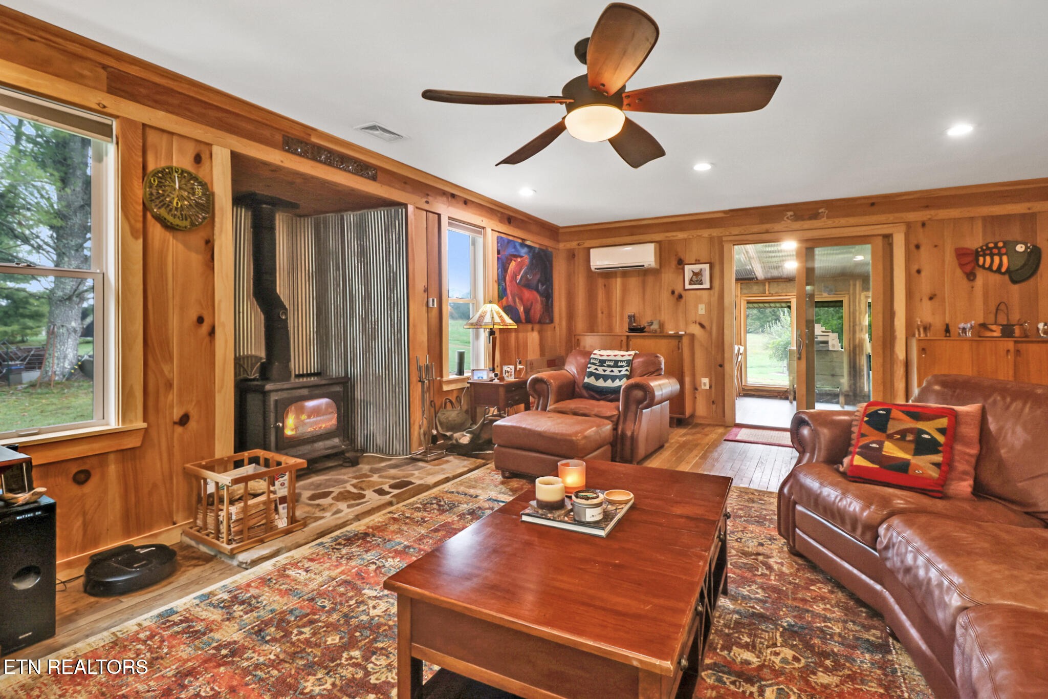 4676 Rugby Pike Allardt, TN 38504 - Photo 34 of 50 a living room with furniture ceiling fan and a large window