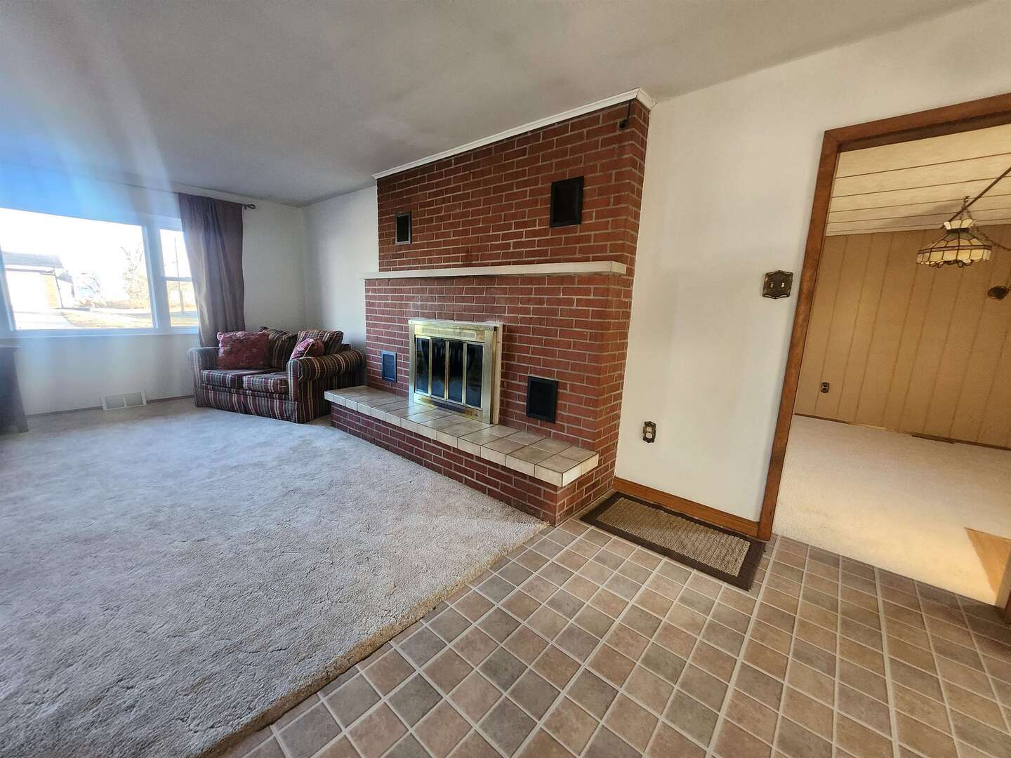 458 West Maple Street Nashville, IL 62263 - Photo 11 of 27 a living room with furniture and a fireplace