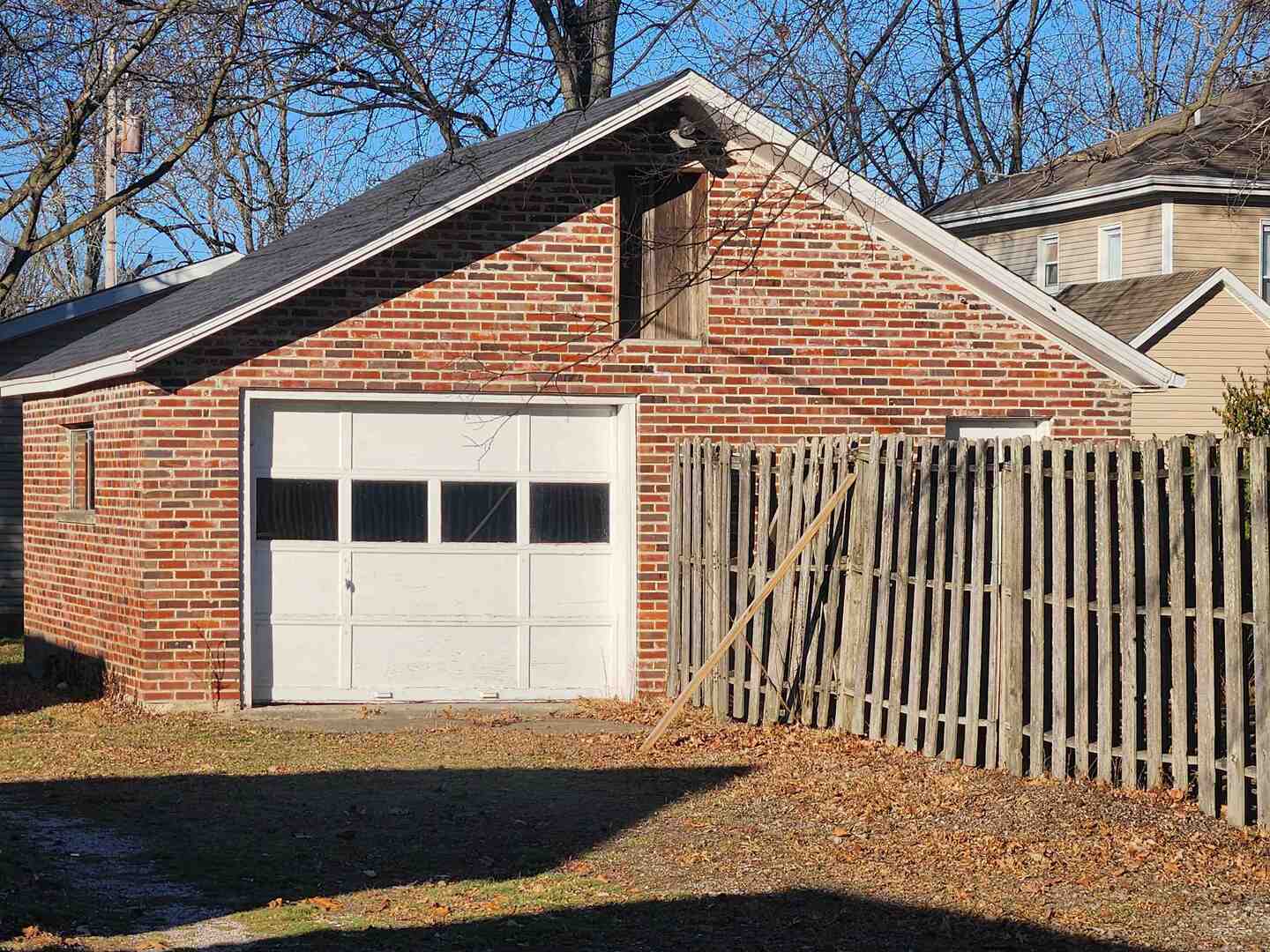 458 West Maple Street Nashville, IL 62263 - Photo 3 of 27 a front view of a house with a garage