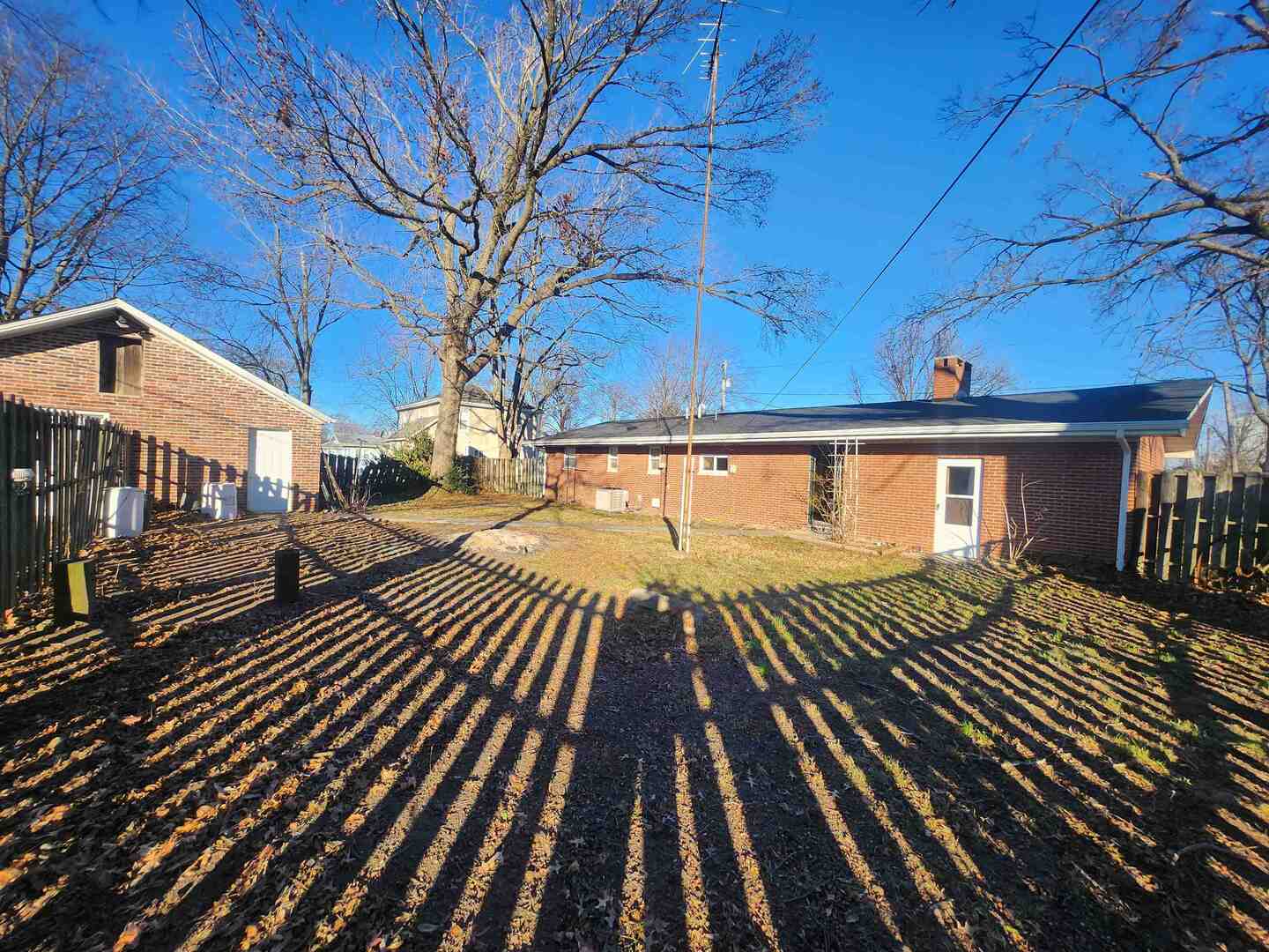 458 West Maple Street Nashville, IL 62263 - Photo 5 of 27 a view of a house with wooden deck