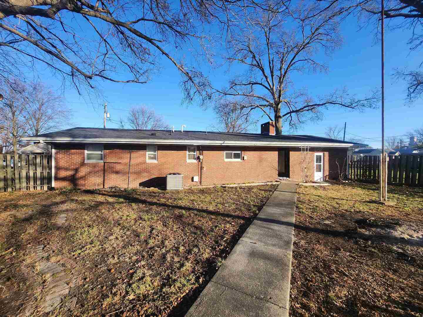 458 West Maple Street Nashville, IL 62263 - Photo 6 of 27 a view of a house with a snow on the road