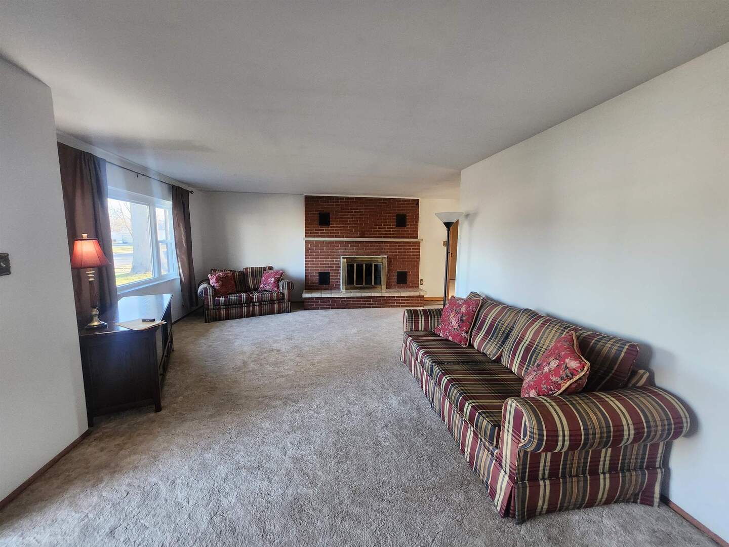 458 West Maple Street Nashville, IL 62263 - Photo 9 of 27 a living room with furniture and a flat screen tv