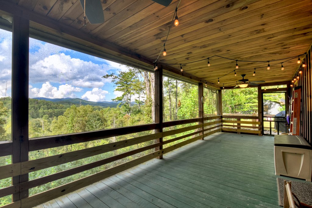 421 Salem Valley Road Mineral Bluff, GA 30559 - Photo 17 of 33 a view of empty room with wooden floor and furniture