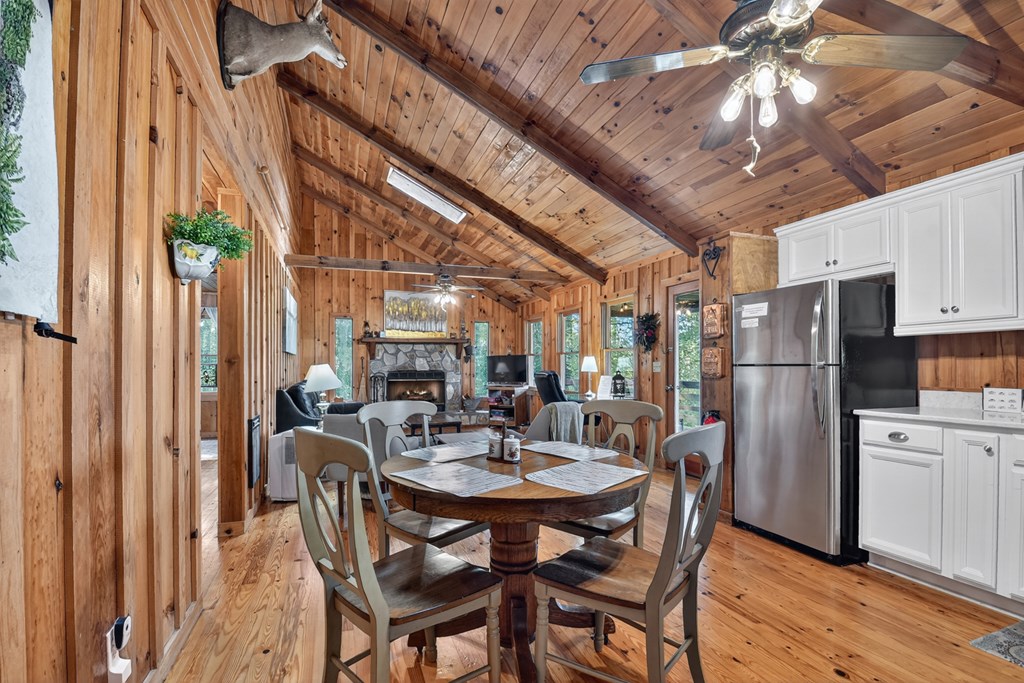 421 Salem Valley Road Mineral Bluff, GA 30559 - Photo 22 of 33 a view of a dining room with furniture window and wooden floor