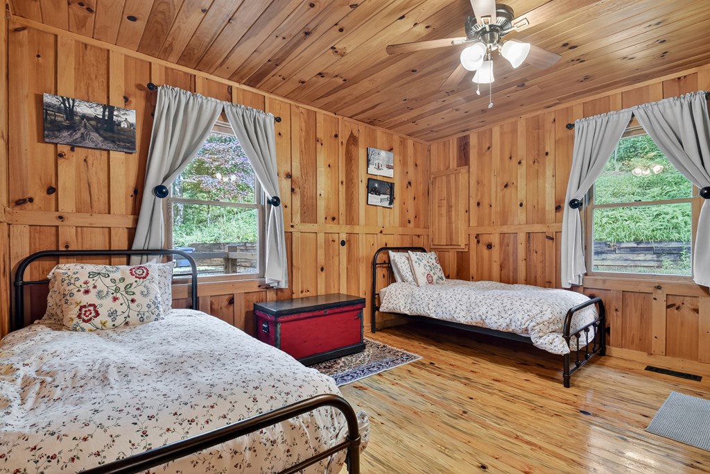 421 Salem Valley Road Mineral Bluff, GA 30559 - Photo 27 of 33 a bedroom with a bed and a window