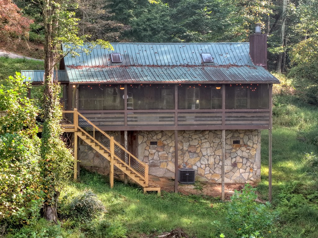421 Salem Valley Road Mineral Bluff, GA 30559 - Photo 6 of 33 aerial view of a house with a yard balcony and furniture