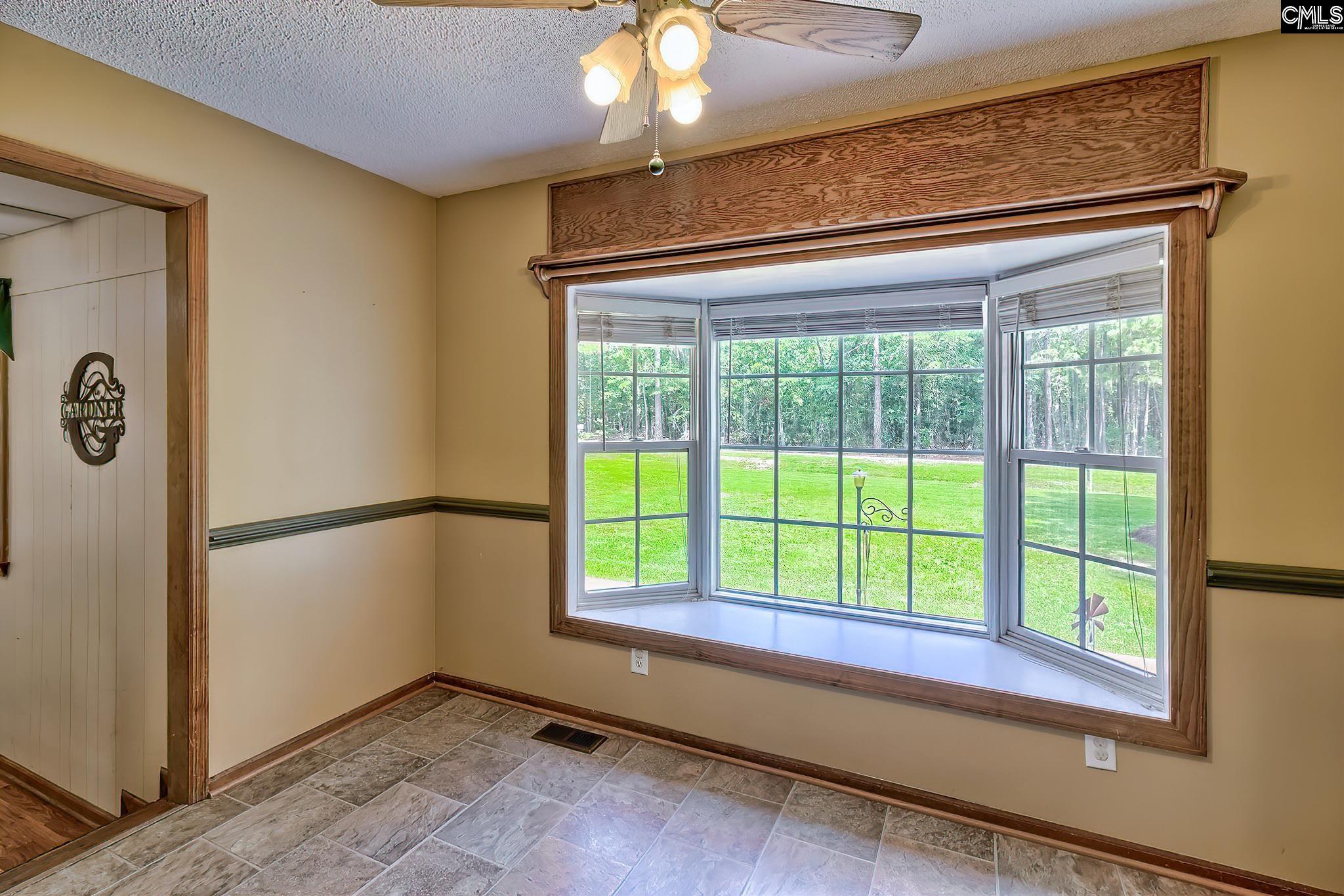 1415 State Rd S-28-55 Lugoff, SC 29078 - Photo 16 of 39 a view of an empty room with window