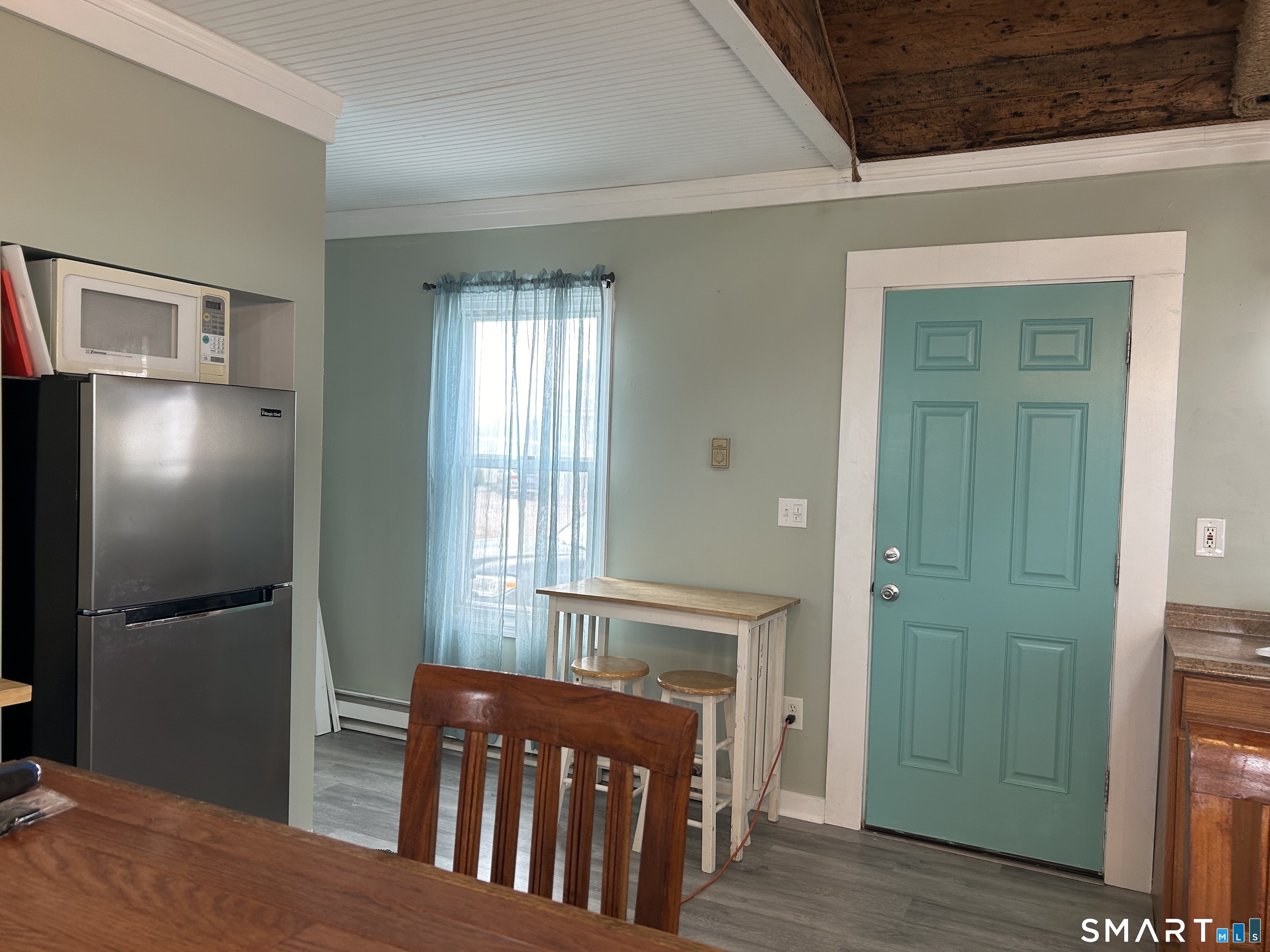 92 Caroline Road East Haven, CT 06512 - Photo 12 of 20 a bedroom with a bed and a window