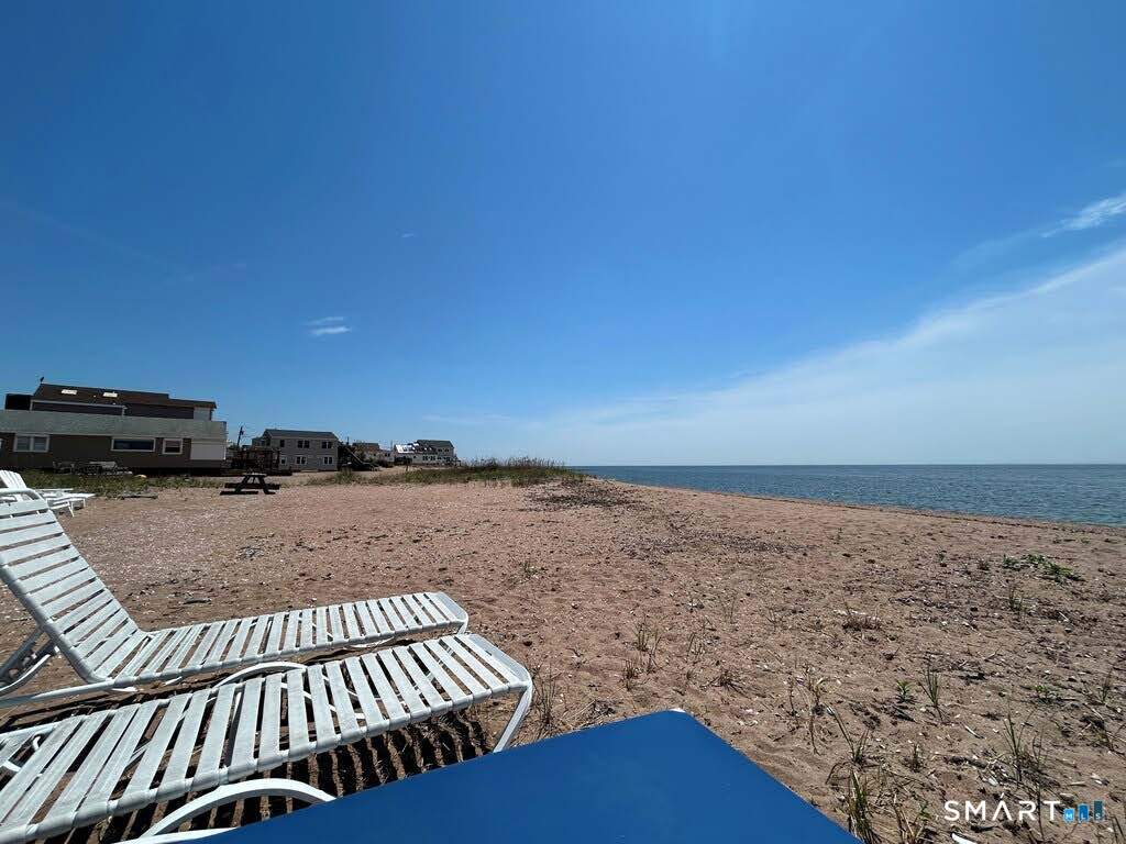 92 Caroline Road East Haven, CT 06512 - Photo 19 of 20 a view of an ocean from a balcony