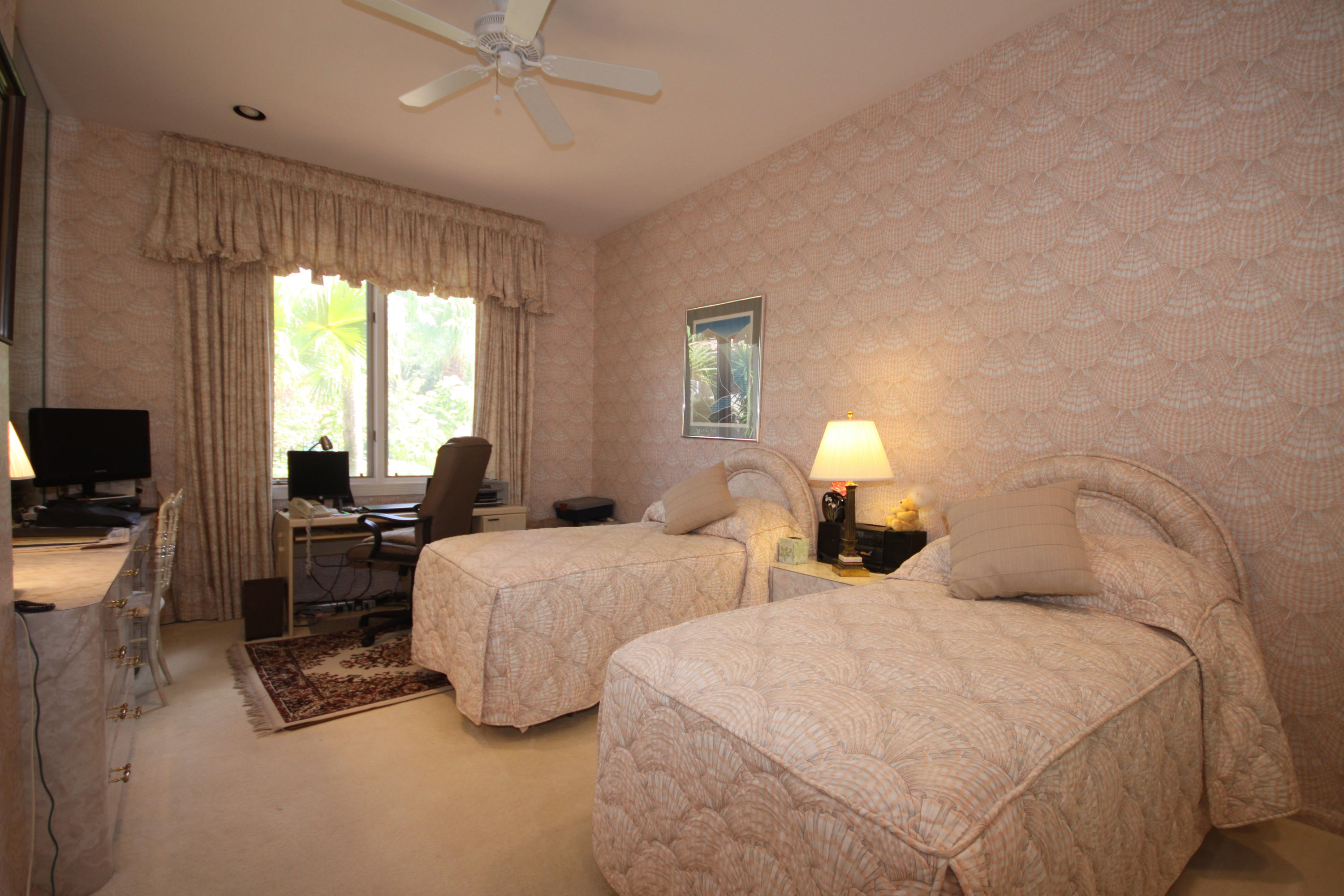 2264 Northwest 60th Street Boca Raton, FL 33496 - Photo 14 of 19 a bedroom with two bed and a lamp