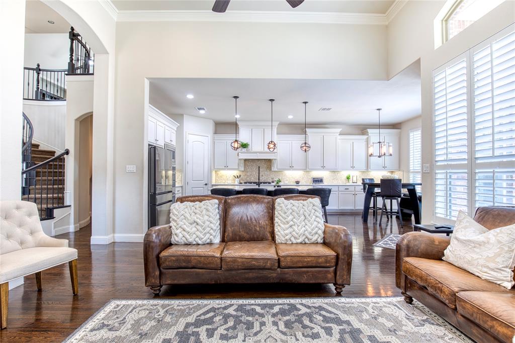 1552 Saddle Tree Road Frisco, TX 75036 - Photo 12 of 40 Open family room looking back towards the fabulous kitchen!