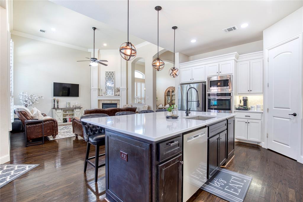 1552 Saddle Tree Road Frisco, TX 75036 - Photo 15 of 40 View of the Kitchen looking back towards the family room