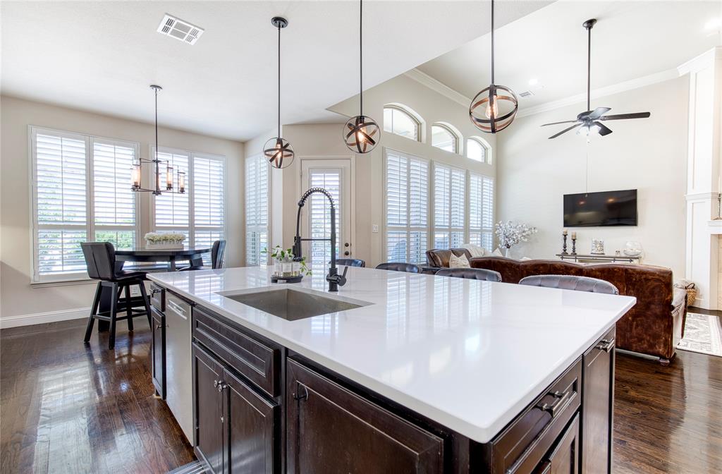 1552 Saddle Tree Road Frisco, TX 75036 - Photo 16 of 40 View of Kitchen looking to family room and breakfast nook area