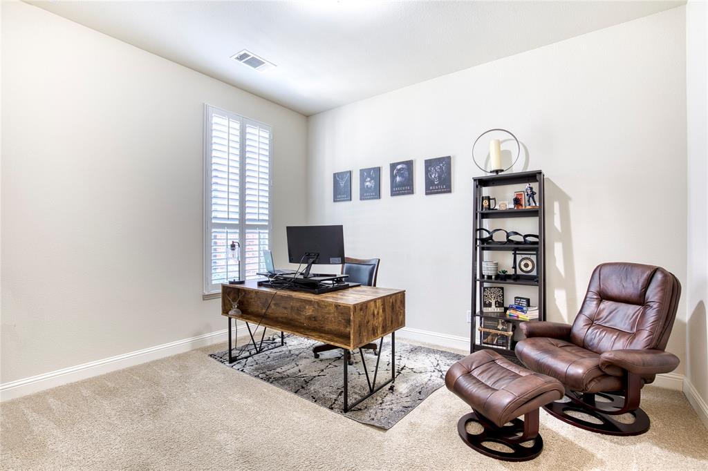 1552 Saddle Tree Road Frisco, TX 75036 - Photo 20 of 40 Good sized secondary bedroom located downstairs. Currently used as a second home office space