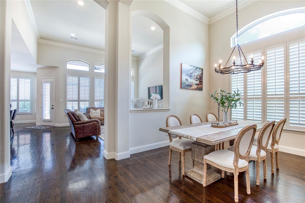 1552 Saddle Tree Road Frisco, TX 75036 - Photo 8 of 40 Dining room with view into the family room and kitchen area. Nice and open which is great flow for entertaining or eating at home!