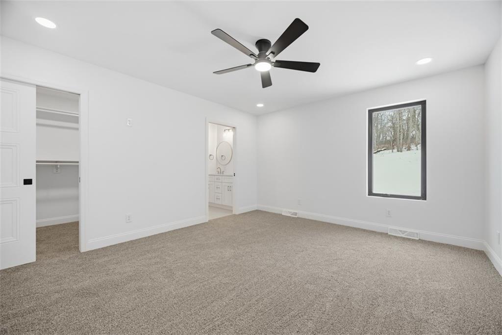 625 Manifold Road Washington, PA 15301 - Photo 22 of 46 an empty room with closet and ceiling fan
