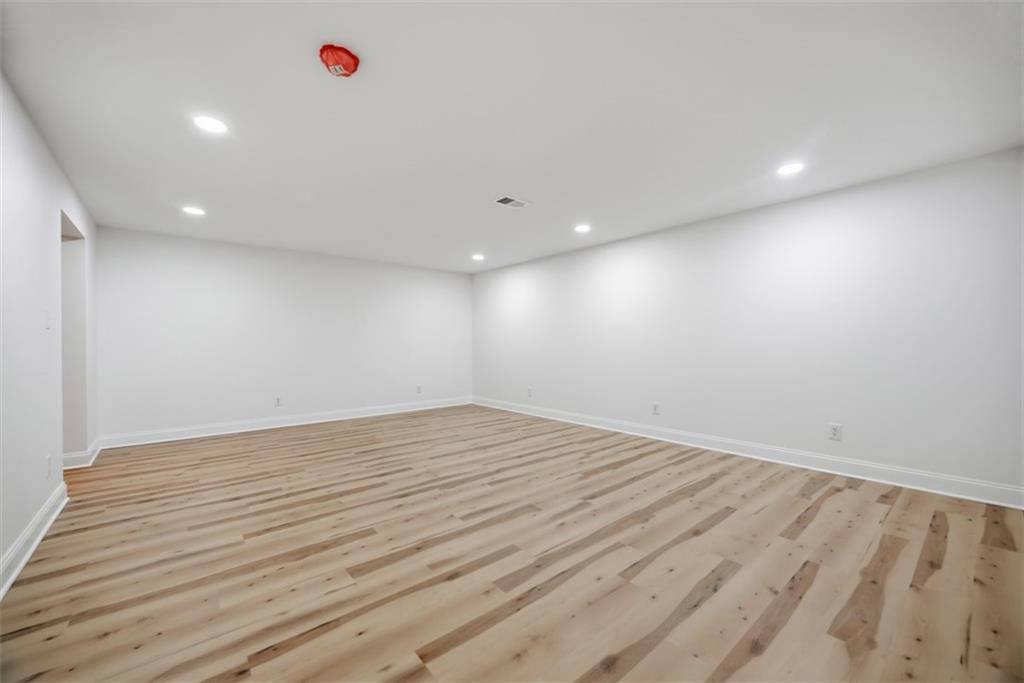 625 Manifold Road Washington, PA 15301 - Photo 34 of 46 an empty room with wooden floor and windows
