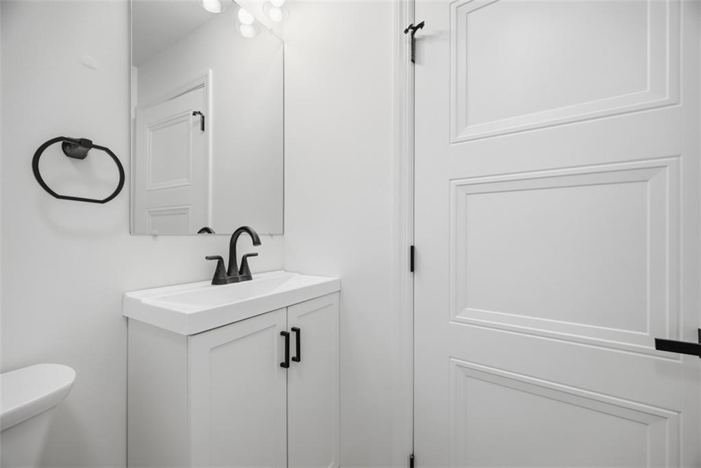 625 Manifold Road Washington, PA 15301 - Photo 35 of 46 a bathroom with a sink a toilet and a mirror