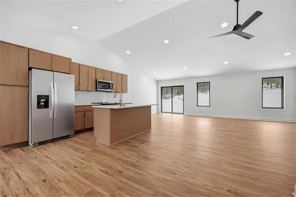 625 Manifold Road Washington, PA 15301 - Photo 5 of 46 a kitchen with stainless steel appliances a refrigerator and a stove top oven