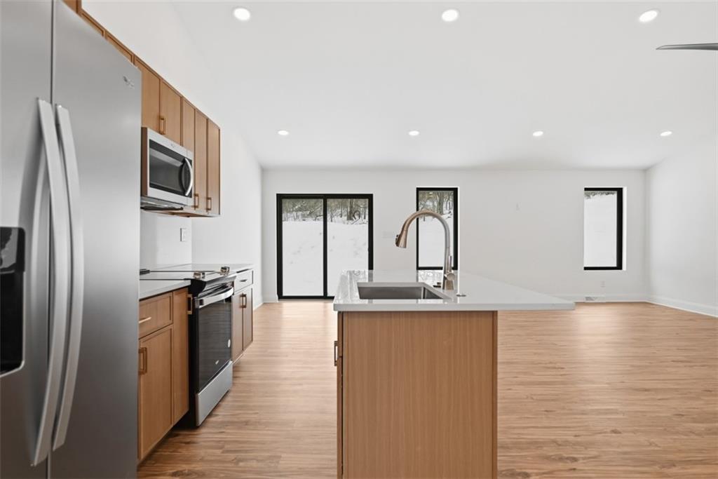 625 Manifold Road Washington, PA 15301 - Photo 8 of 46 a kitchen with stainless steel appliances granite countertop a refrigerator and a stove