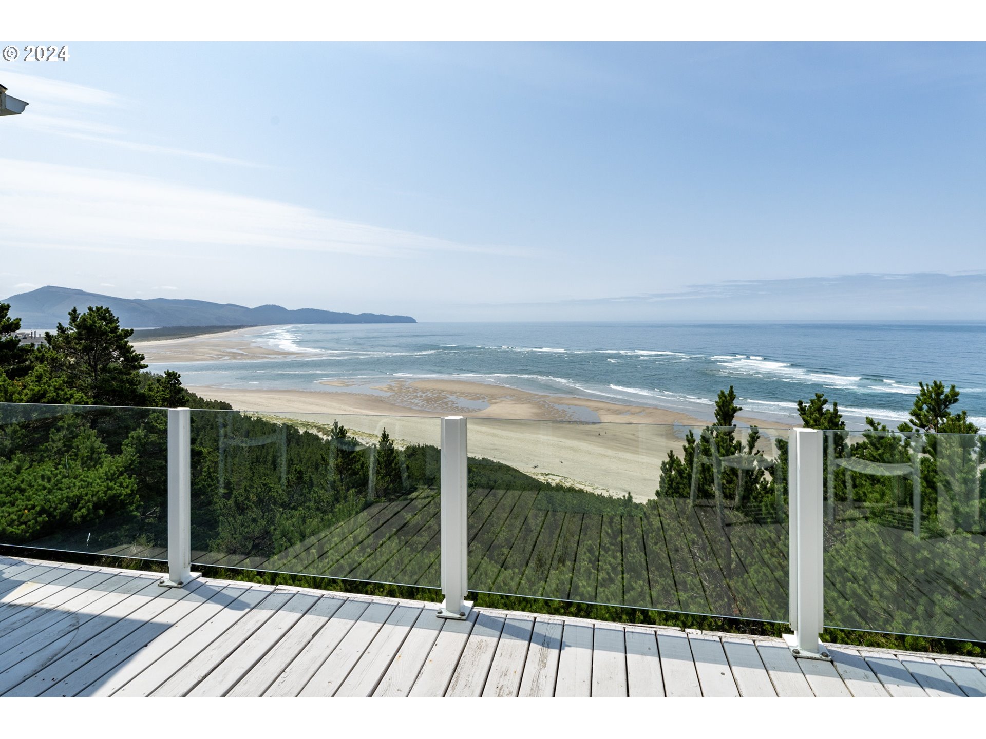 130 Capes Drive Oceanside, OR 97141 - Photo 2 of 48 a view of lake from balcony