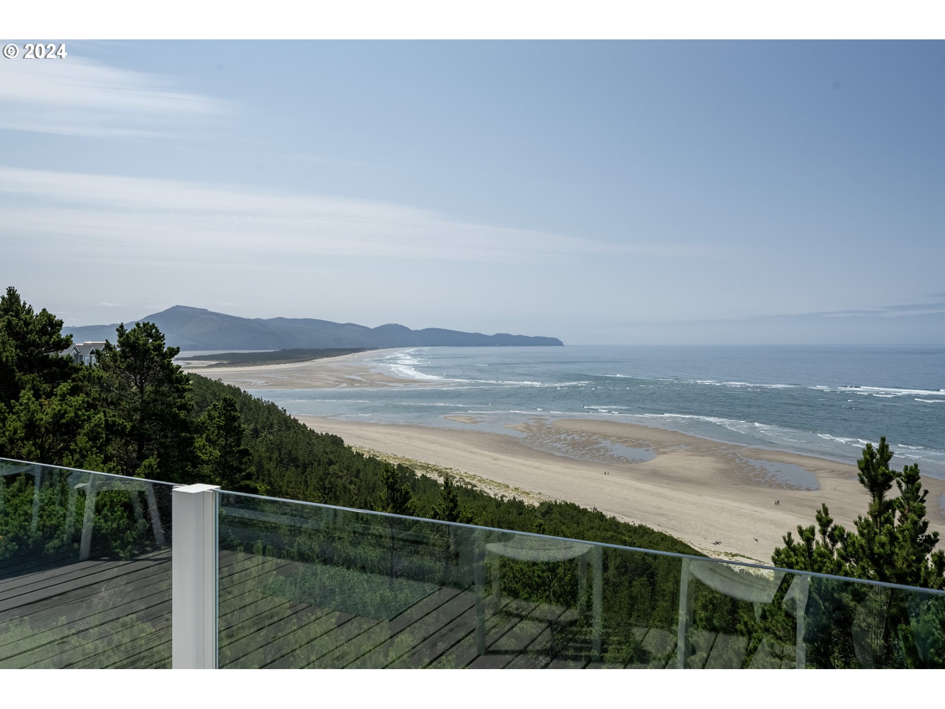 130 Capes Drive Oceanside, OR 97141 - Photo 22 of 48 a view of an ocean and beach