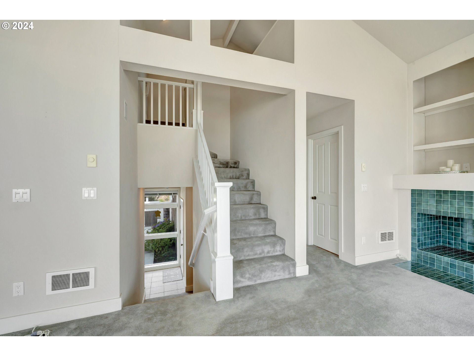 130 Capes Drive Oceanside, OR 97141 - Photo 25 of 48 a view of an entryway with staircase