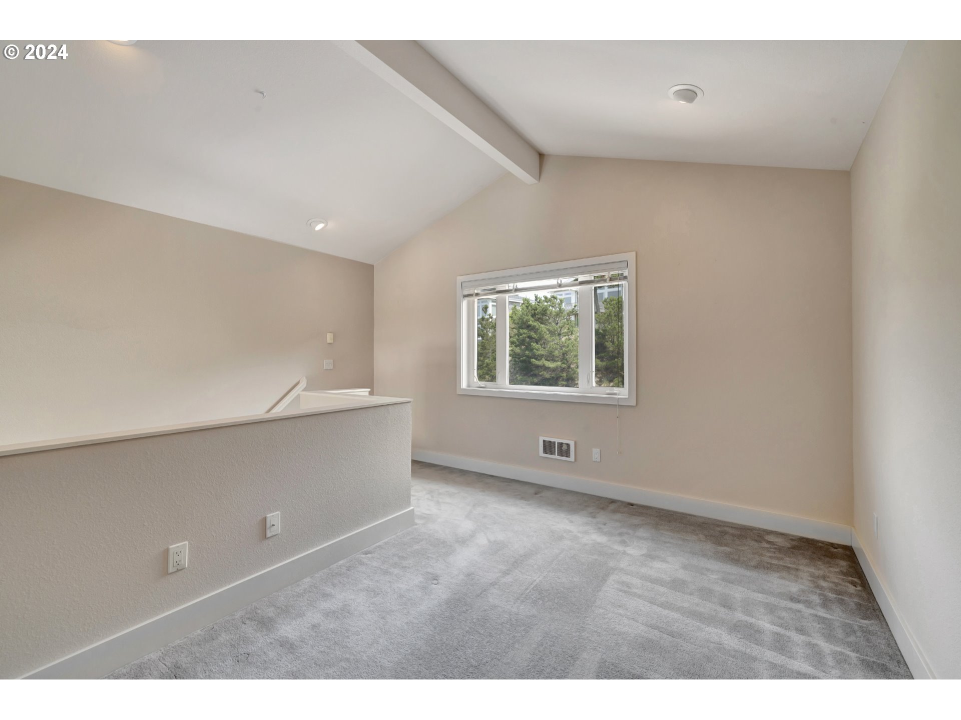 130 Capes Drive Oceanside, OR 97141 - Photo 29 of 48 a view of an empty room with a window