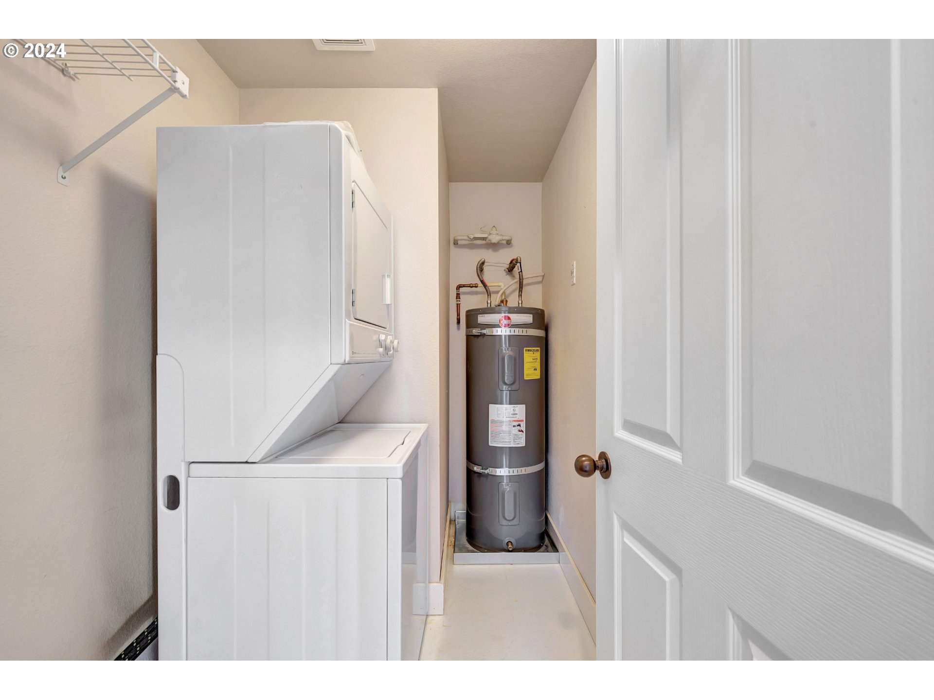 130 Capes Drive Oceanside, OR 97141 - Photo 37 of 48 a utility room with closet dryer and washer
