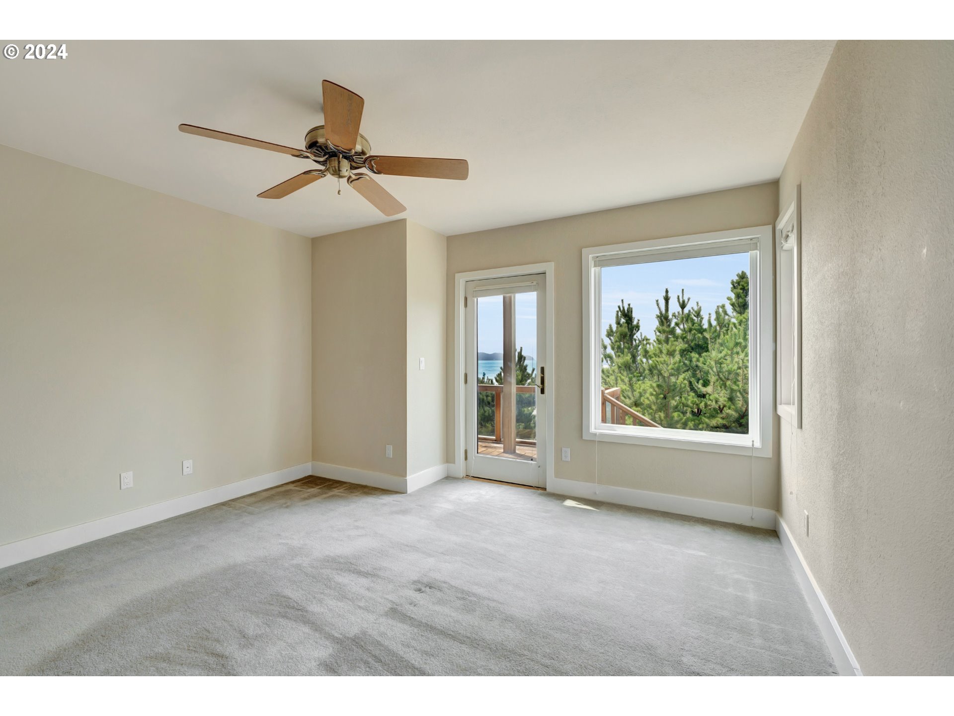 130 Capes Drive Oceanside, OR 97141 - Photo 39 of 48 a view of an empty room with a window
