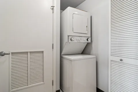 a bathroom with a sink toilet and mirror