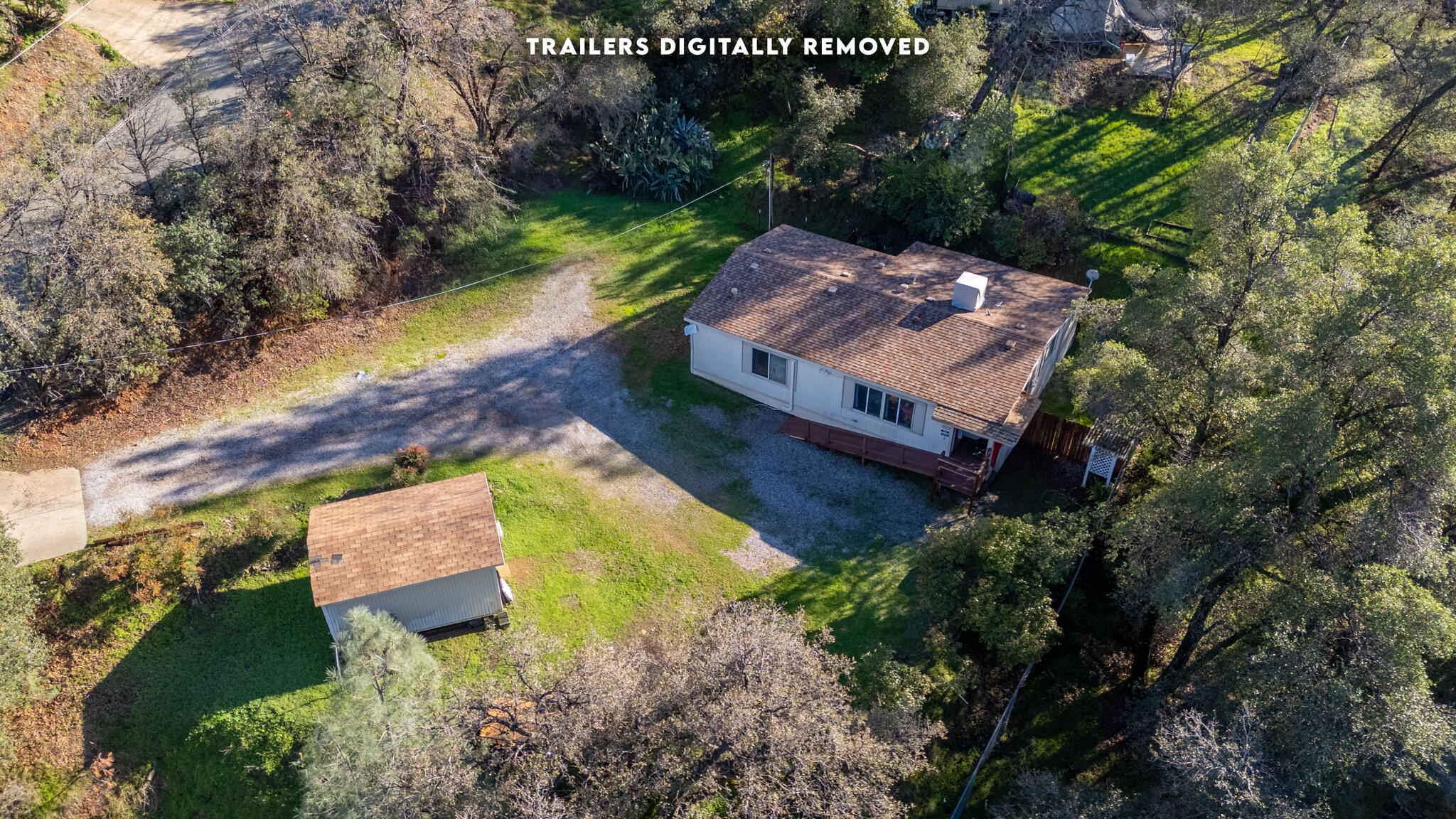 Undisclosed Address Redding, CA 96003 - Photo 1 of 39 an aerial view of a house with a garden