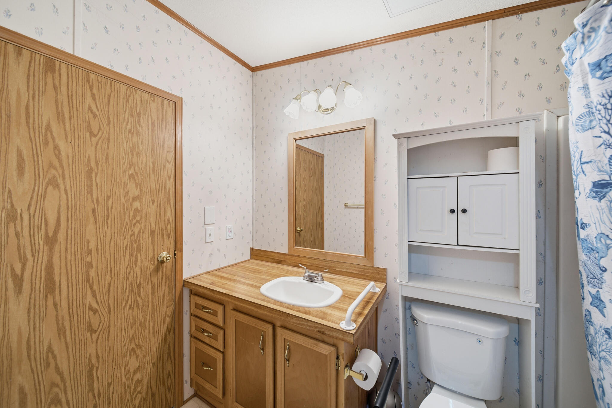 Undisclosed Address Redding, CA 96003 - Photo 13 of 39 a bathroom with a sink and a mirror