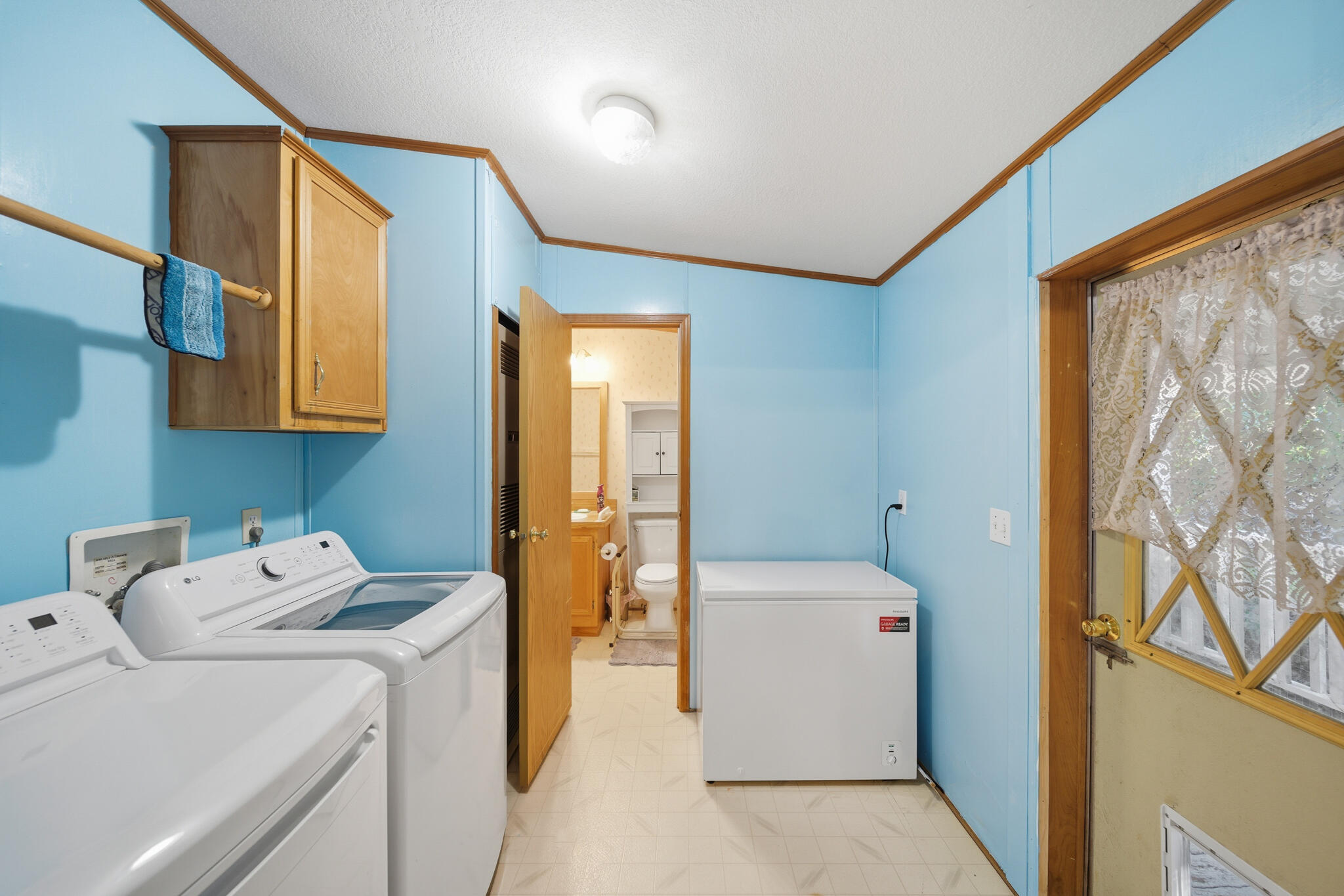 Undisclosed Address Redding, CA 96003 - Photo 16 of 39 a utility room with dryer and washer