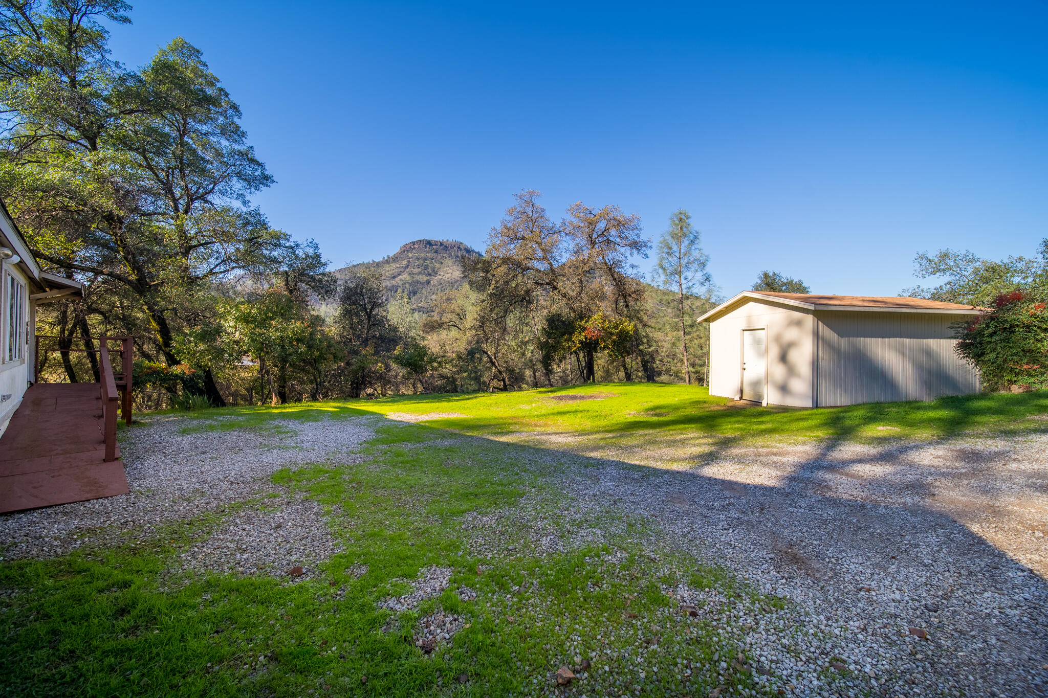Undisclosed Address Redding, CA 96003 - Photo 2 of 39 a view of a yard with swimming pool