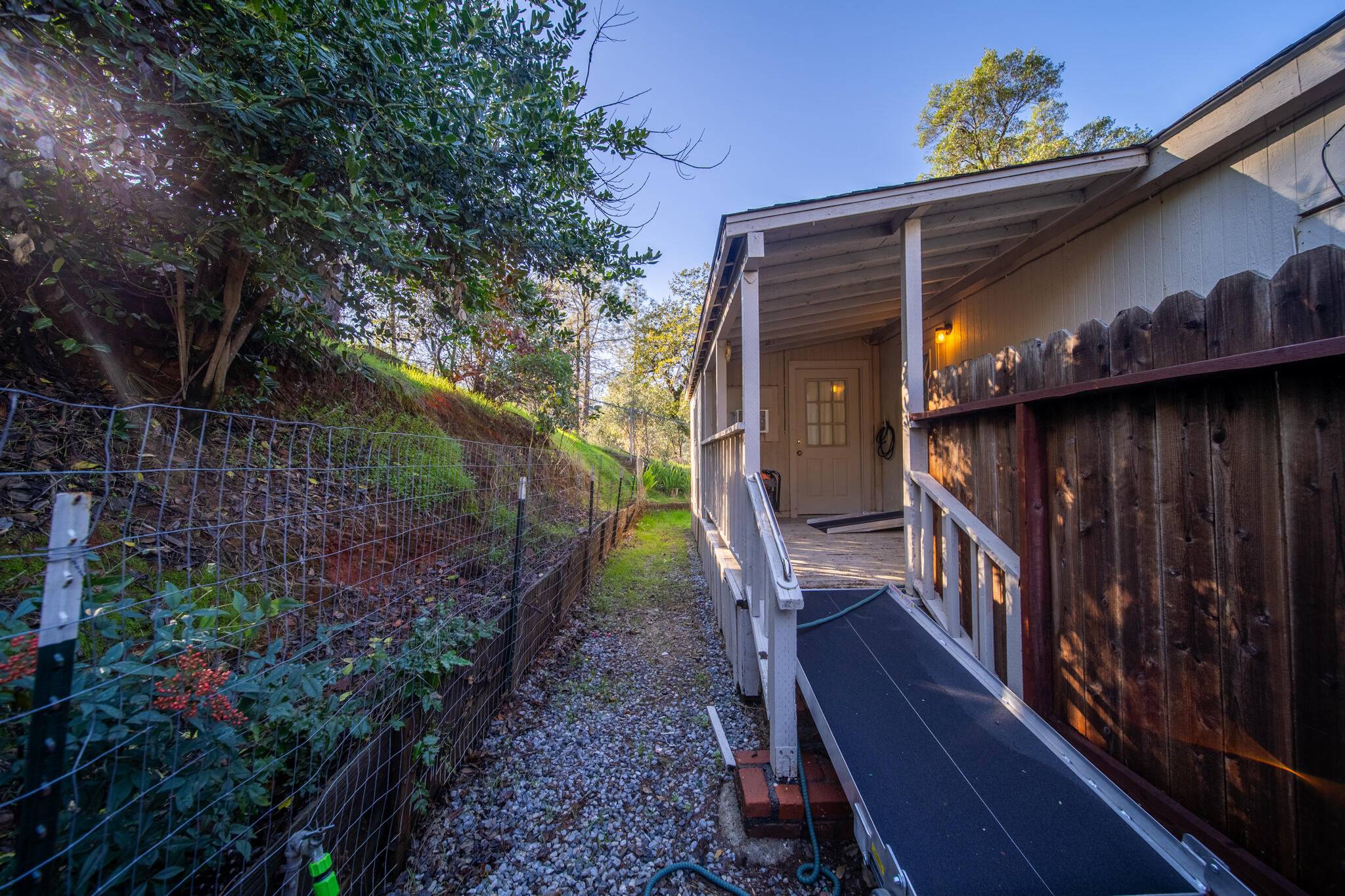 Undisclosed Address Redding, CA 96003 - Photo 22 of 39 a house view with a backyard space